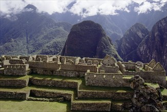 View to the east across the centre of Machu Picchu shows terraces and buildings