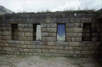 Inca room with two blocked and two free windows which face the Urubamba valley at Machu Picchu