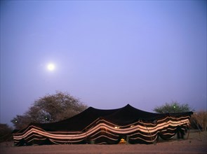 A Bedouin tent at night