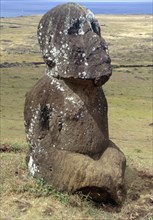 The famous kneeling statue Tukuturi, located on the flank of the Rano Raraku quarry