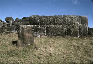 The so-called "Inca-style" masonry at Ahu Vinapu, with a half buried Moai head in the foreground