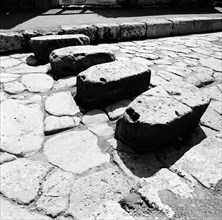 Stepping stones cross a Pompeii street