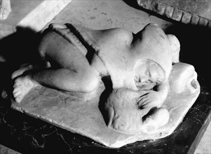 A relief of a sleeping boy from a fountain in the Via di Mercurio