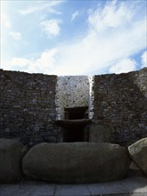 The incised entrance stone in front of the mouth of the passage to the burial chamber at Newgrange