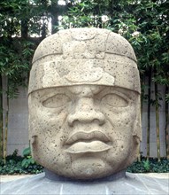 Colossal Olmec head ( Monument 1 ), from the site of San Lorenzo, now displayed at the Jalapa Museum, Veracruz, Mexico