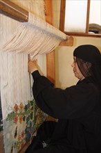 Soraia Hassan, a weaver at the Ramses Wissa Wassef Art Centre and her loom