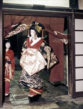 Geisha entering a tea house in the Shimabara district of Kyoto, one of Japan's earliest pleasure quarters which opened in the time of Hideyoshi Toyotomi