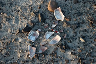 Ritually smashed polychrome pottery found on a Nazca Line
