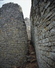 Path between the enclosure wall and the conical tower from great Zimbabwe