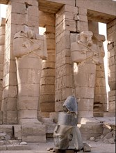View of the Ramesseum and the Osiride statues, the mortuary temple of Ramesses II