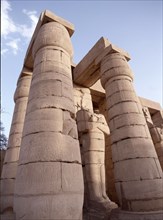 View of the Hypostyle Wall and an Osiride statue at the Ramesseum, the mortuary temple of Ramesses II