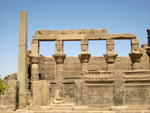 The kiosk of Pharaoh Nectanebo I, showing columns topped by carved images of the cow-goddess Hathor
