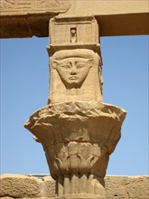 Detail of column capital carved with the head of the goddess Hathor in her cow form