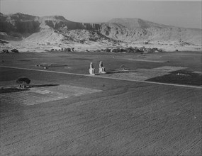 View of the colossi of Memnon, photographed in the 1920's