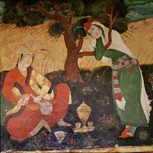 A wall painting in the Hall of One Hundred Pillars in Isfahan depicting a man and a girl taking refreshments in a garden