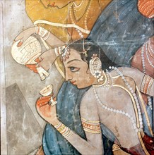 A detail of a scene from one of the legends of Krishna