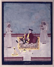An official of the East India Company enjoying smoking a water pipe