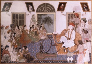 Sir David Ochterlony, Resident at the court of the Great Mogul in Delhi dressed in Indian clothing and smoking a hookah is entertained by a group of dancing girls