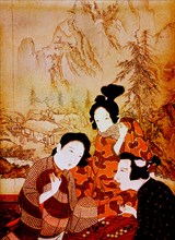 A 19th century copy of a 17th century woodblock print depicting two ladies playing a board game