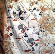 Detail of a temple cloth in which Krishna plays his flute among the cows and herdsmen with whom he spent his youth