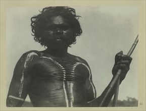 Portrait of aboriginal man with body paint