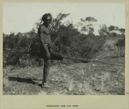 Portrait of aboriginal man with spears