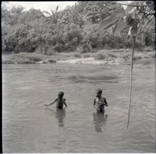 Abange's son and Banyu in river
