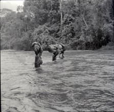 Boys crossing river