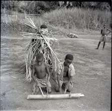 Boys society, drummers and masked dancer