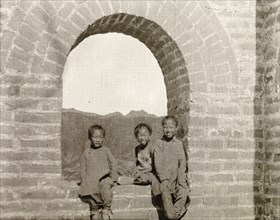 Children at a watchtower on the Great Wall of China