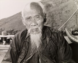 An elderly Chinese fisherman