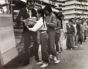Children queuing for food, Hong Kong