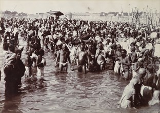 Pilgrims bathing at the Kumbh Mela