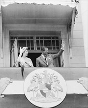 Close up of Princess Elizabeth and the Duke of Edinburgh on the balcony of Nairobi City Hall
