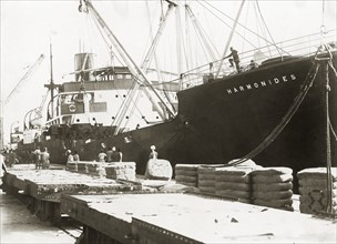 Unloading cargo from SS Harmonides