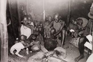 Evening meal in a Kikuyu hut