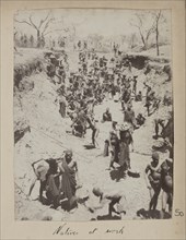 African labourers working in a trench