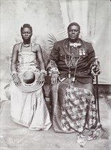 Portrait photograph of an African Chief and his wife