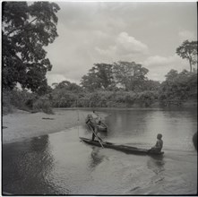 Journey from Ibadan to Cameroons, second ferry on Ikom road, canoe fisherman