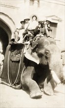 Europeans take an elephant ride