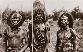 Three Massai men in British East Africa