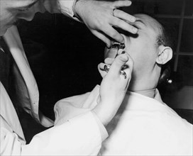 Dentist Giving A Novocain Shot