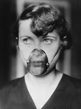 Woman Wearing Inhalation Mask