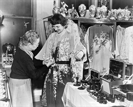 Woman Trying On Oriental Robe