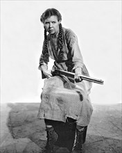 Woman Holding A Rifle