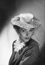 Woman Wearing A Hat & Veil