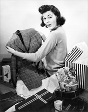 Woman Opening Presents