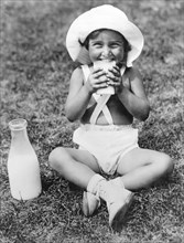 Young Girl Drinking Milk