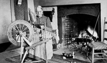 Woman Spinning Wool