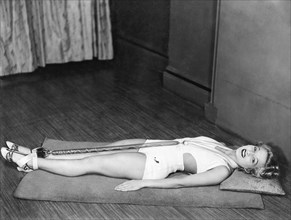 A Young Woman Exercising